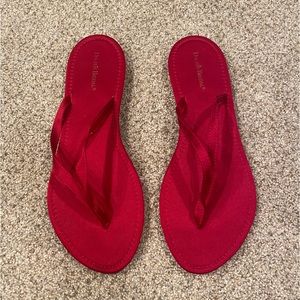 Women’s red satin flip flops